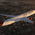 Flying toward the next destination against the sunset.